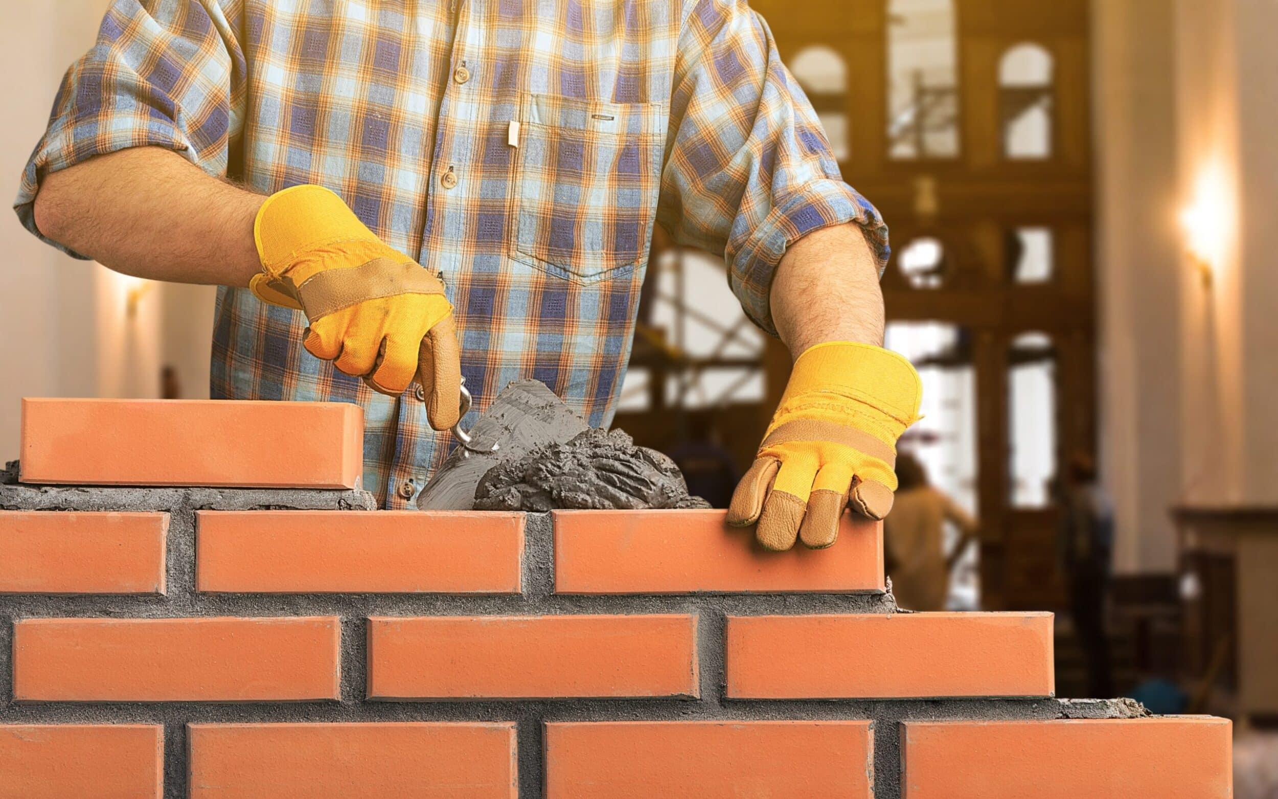 Portrait of young profession man at work on background